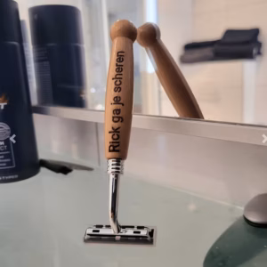 Scheermesje met opdruk (logo)